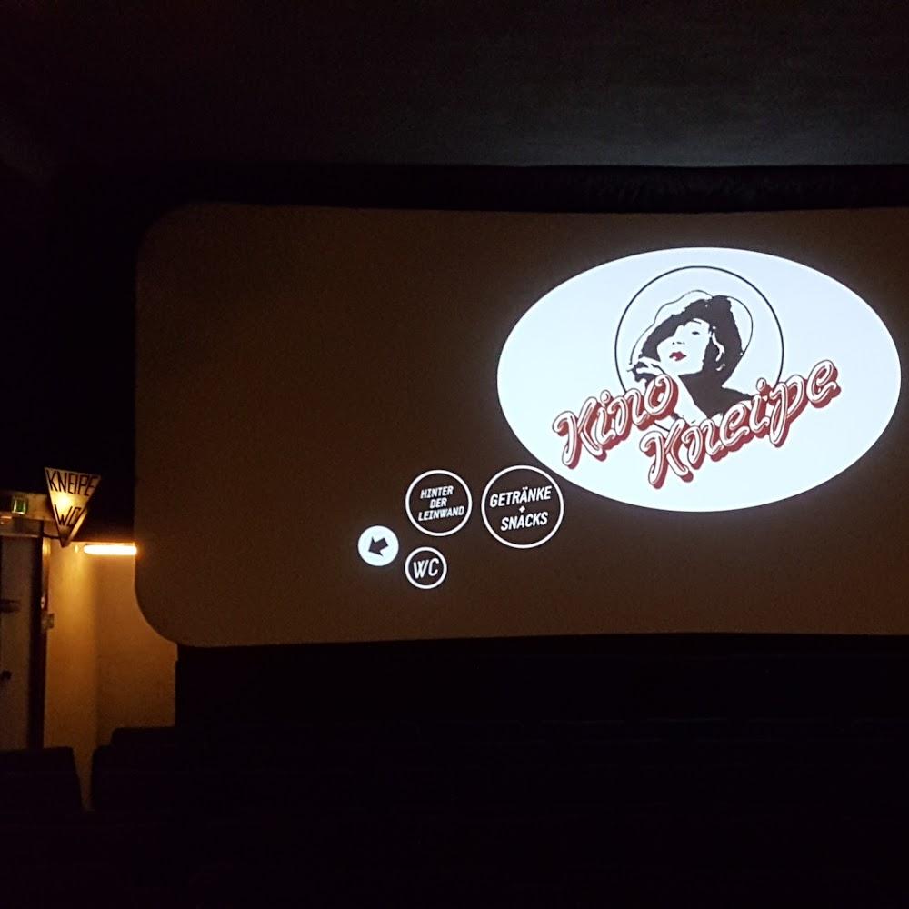 A movie theater screen displaying